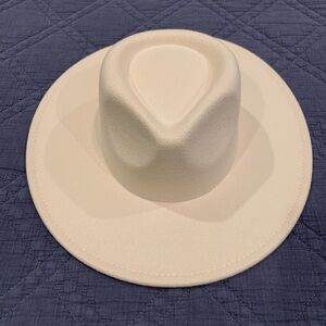 New stylish boutique,  Ivory hat, never worn.